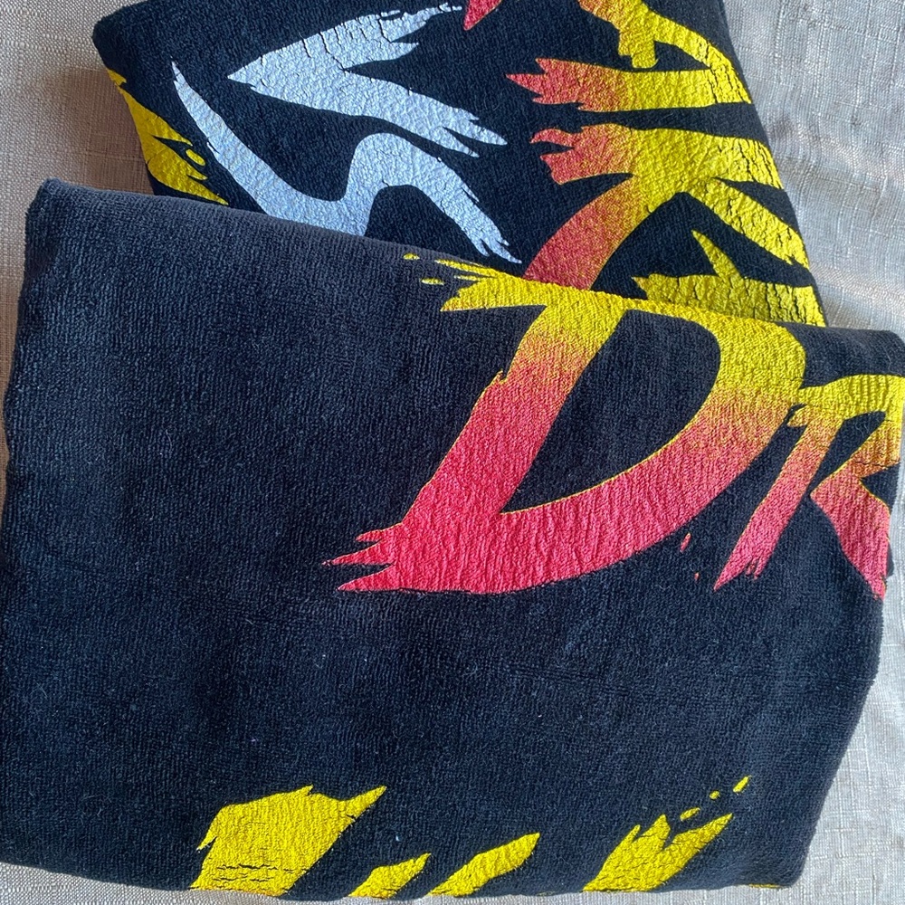 Drake Black Towel with Red and Yellow Accents